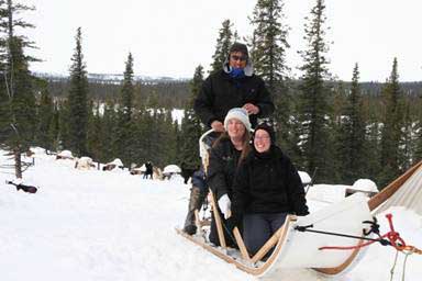 John takes his sisters out for a drive and explains the art of mushing before turning us loose with our own teams.
