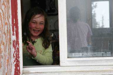 Tahayla wakes up from a nap and ready for more fun in the snow.