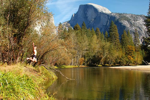 Adam taking a flying leap into a very cold river during our picnic stop at Half Dome