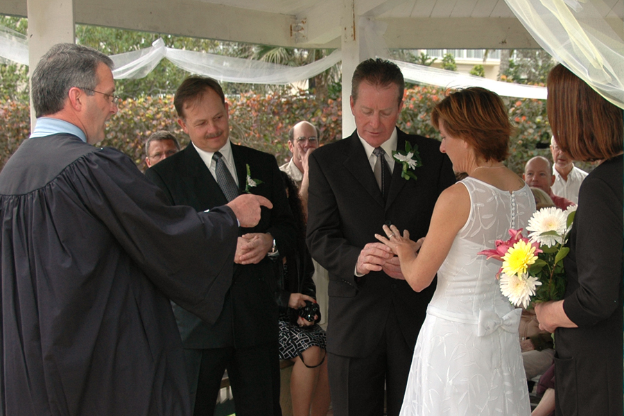Chip officiating and Polly and John's wedding