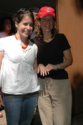 Bobbie and Holly showing off engagement rings