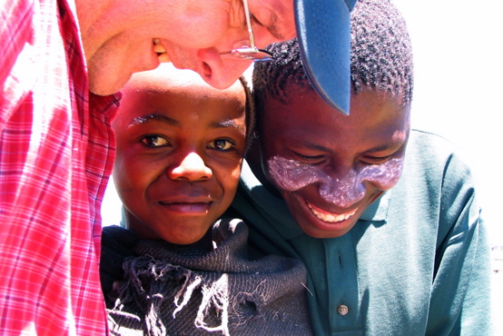 Showing some herd boys their image on the camera LCD