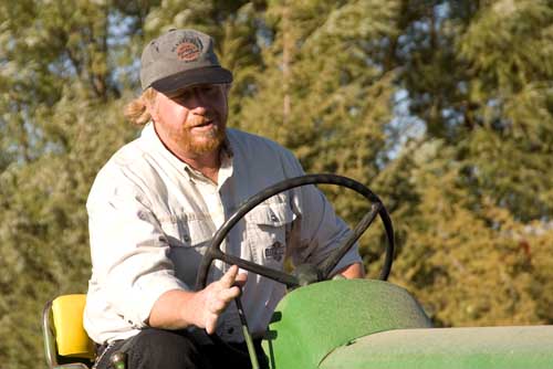 Vince driving one of Rob's vintage John Deere's