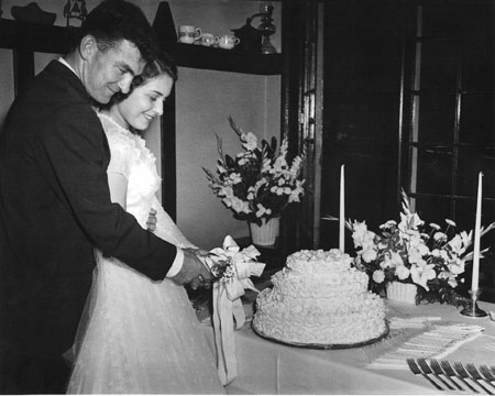 Bride & Groom Cutting Cake