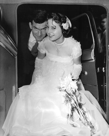 Bride & Groom Getting Into Car