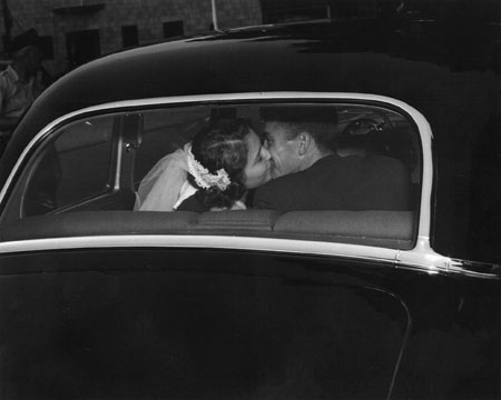 Bride & Groom Kissing In Car
