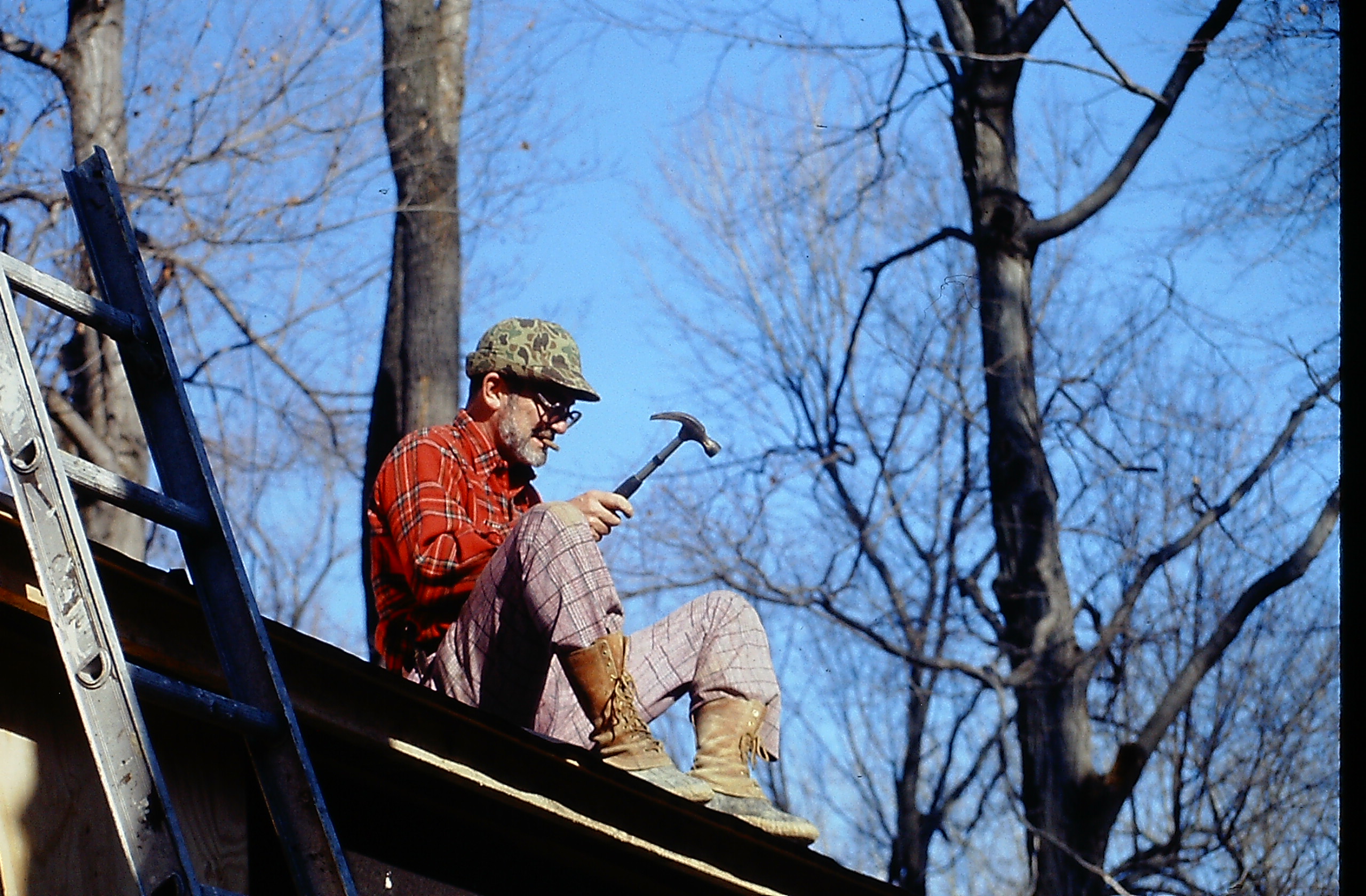 Gene roofing the shed.