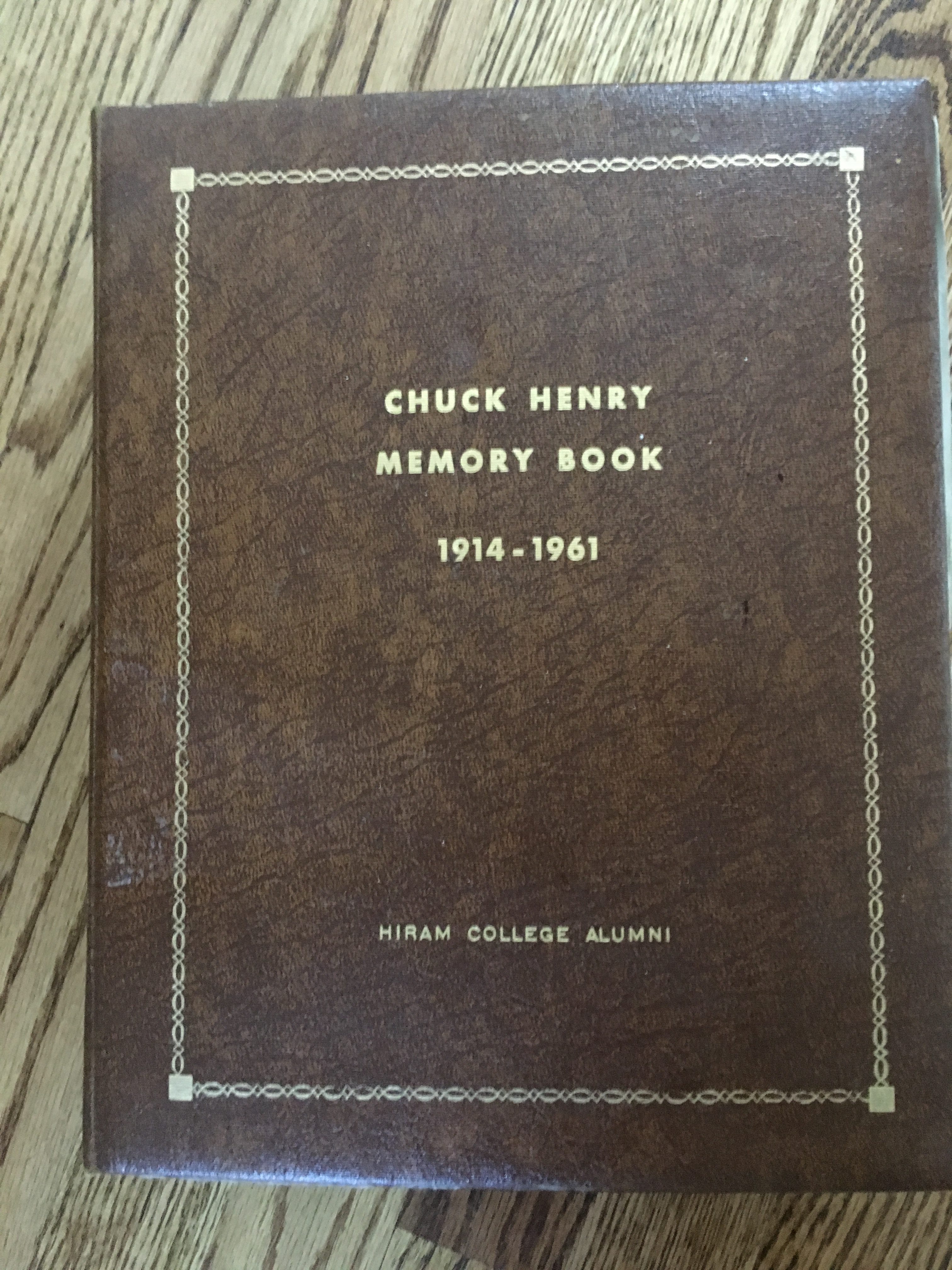 Cover of the Memory Book given to Chuck Henry