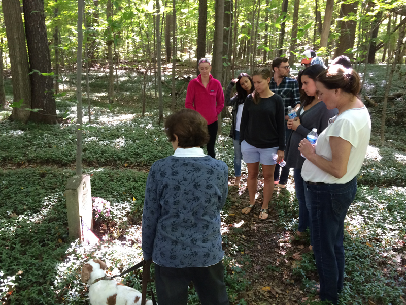 Joan discussing individuals buried at the cemetery